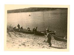 Men set off in boats