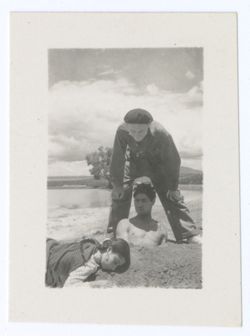 Item 1143. "Maria" (Isabel Villasenor) lying on ground where "Sebastian" (Martin Hernandez) is buried to his chest. Unidentified man standing over them. See also Item 224 and 390 above.