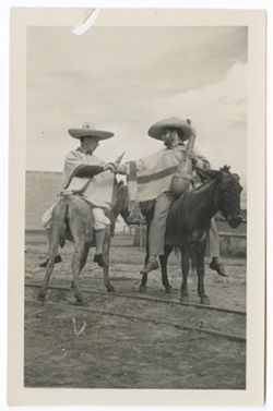 Item 0410a.  Various shots of Eisenstein and man seen in Items 398, 401-407 above, riding donkeys in courtyard of Hacienda. On back of each, written in pencil: "4."