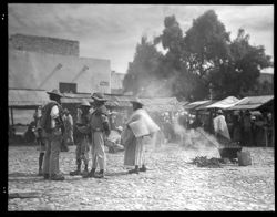 Market at Zimapan, near meat boiling kettles