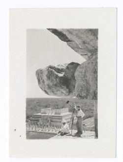 Item 1002. - 1003a. Various shots of Eisenstein with Alexandrov, Tissé and an unidentified man (separately) on the upper platform of the Castillo. Eisenstein seated or kneeling at corner of platform, other men standing behind camera.