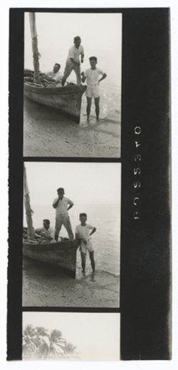 Item 0541. Various shots of Kimbrough and others in and around sailboats and canoes. Location probably the same as for items 536-540 above. 2 1/3 contact prints on a strip.