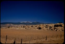 Snow-capped Mount Taylor (11389 ft. elev.) seen from US 66 east of San Fidel, N. Mex.
