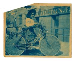 Woman with floral-themed bicycle