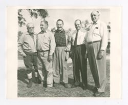 Roy Howard stands with others 3