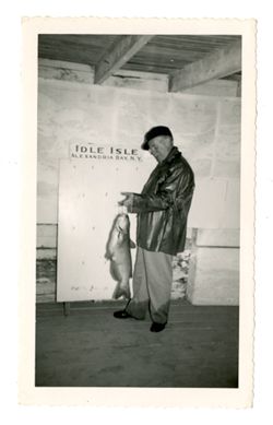 Roy Howard posing with a fish