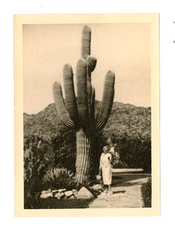 Margaret Howard next to a large cactus