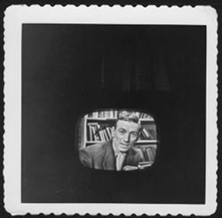 Television with image of Hoagy Carmichael in front of bookshelves.