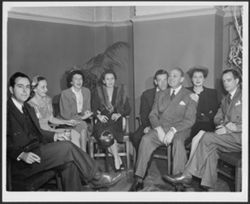 Seven unidentified men and women and Hoagy Carmichael.