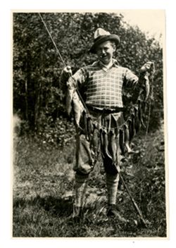 Roy Howard holding string of trout