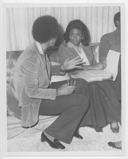 Belva Davis with unidentified woman