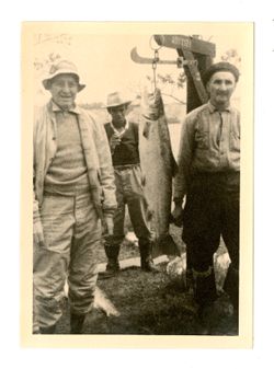 Three men with fish