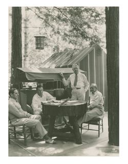 Photograph of four men
