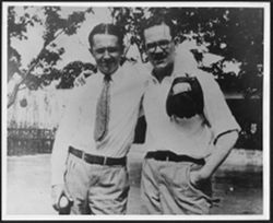 Leon "Bix" Beiderbecke (with baseball and mitt) standing with Don "Red" Ingle.