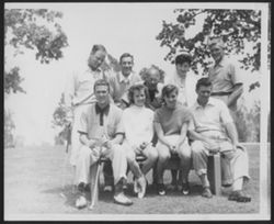 Hoagy Carmichael posing with seven unidentified people at the Ojai Valley Country Club.