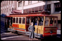 California St. Cable car stops at Grant Ave. San Francisco.
