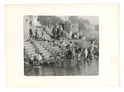 People on steps of Ghat leading into the Ganges