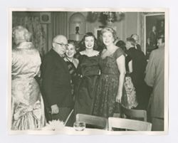 Roy Howard and female friends at an event