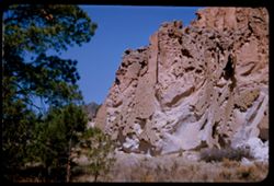 Great pocked cliffs seen on way to Bandelier National Monument. New Mexico.