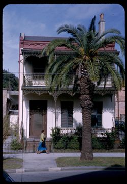 Palm in front of house with iron balcony 350 Church St. at corner of Claiborne MOBILE