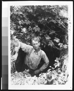 Peter Beard of Laconia, in the entrance of Boone cave, Harrison County