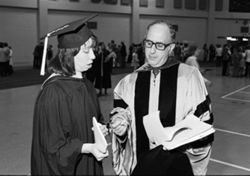 Chancellor Lester Wolfson with IU South Bend graduate, 1976