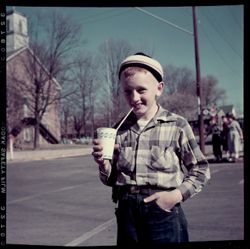 Boy sipping drink from a straw
