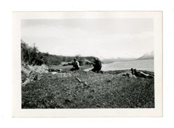 Men on shore of Uyak Bay 2