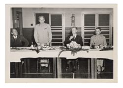 Four men at a panel discussion