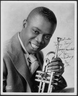 Portrait of Louis Armstrong with Conn 56B trumpet