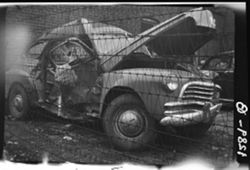 Herb Miller's wrecked car at Elwood, 1947