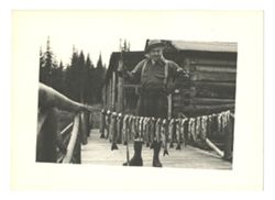 Roy Howard posing with fish