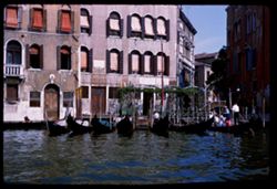 Venice street scene Gondolas along sidewalk O & S