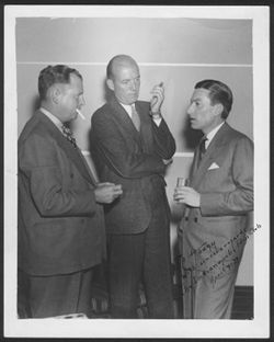 Autographed photo of Hoagy Carmichael and two unidentified men.