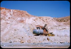 Blasting out a mountain side for new mine of Phelps-Dodge.  Lowell, Ariz.