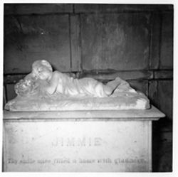 Reclining figure of child (Elliott Mausoleum - Sec. 4) Jimmie (Marble)
