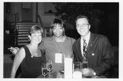 Photo of three unidentified people from inside 1980 Oscar Micheaux Awards Ceremony program