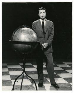 Coughlan with globe on set of Omnibus