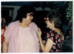 Phyllis Klotman talking to unidentified woman during Pan Am Festival