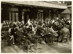 Sidewalk cafes are popular in Paris