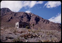 Stone house and mountain backdrop.  Franklin Mtns. north of El Paso, Tex.