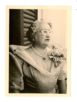 Peggy Howard in dress and necklace