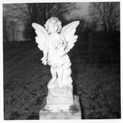 Figure of Angel carrying Roses 2 boys.