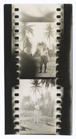 Item 0530. Alexandrov and another man (Kimbrough or Best Maugard?) standing in a sandy area with palm trees in background. 2 1/3 prints on a strip.