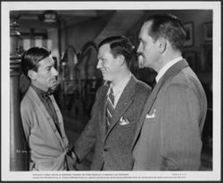 Hoagy Carmichael talking with Harold Russell (middle) and Frederick March (right) in a still from the movie Best Years of Our Lives.