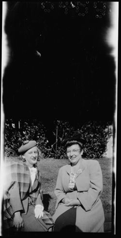 Lida Carmichael outside with an unidentified woman.