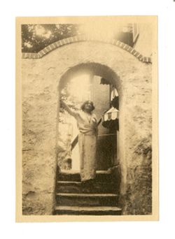 Margaret Howard standing in an archway