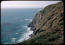 Cliff and green sea The California coast between San Simeon and Big Sur