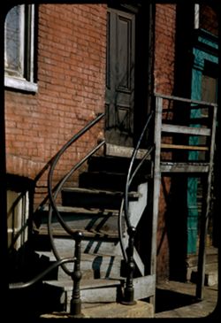 Curved stairway. 258 W. 23rd St. Chgo