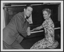 Hoagy and Lida Carmichael at a piano.